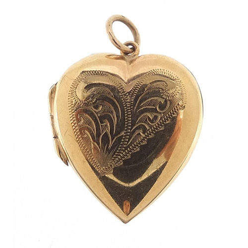 288 - 9ct gold love heart locket with engraved decoration, 2.2cm high, 3.8g