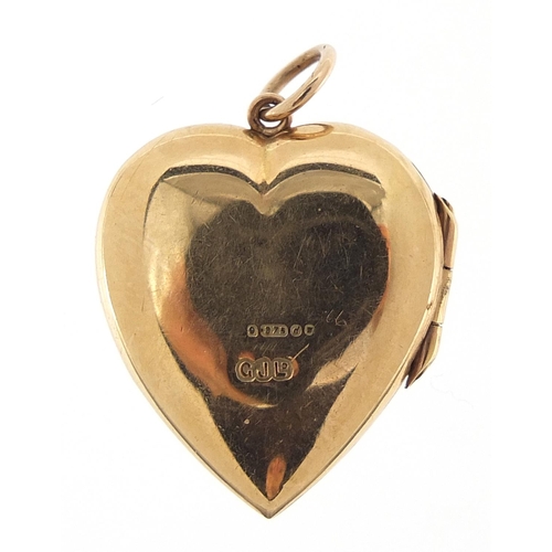 288 - 9ct gold love heart locket with engraved decoration, 2.2cm high, 3.8g