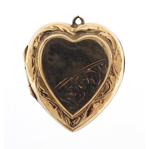 301 - 9ct gold back and front love heart locket with engraved decoration, 2.1cm high, 3.1g