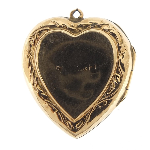 301 - 9ct gold back and front love heart locket with engraved decoration, 2.1cm high, 3.1g