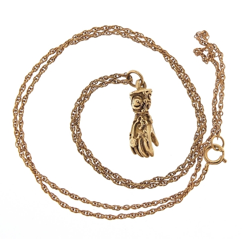 181 - 9ct gold hand pendant on a 9ct gold necklace, 1.8cm high and 46cm in length, 3.1g