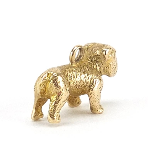 210 - 9ct gold dog charm, 1.4cm wide, 1.9g