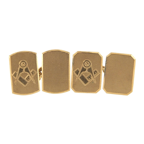 146 - Pair of 9ct gold masonic cufflinks with engine turned decoration, 1.5cm high, 4.6g