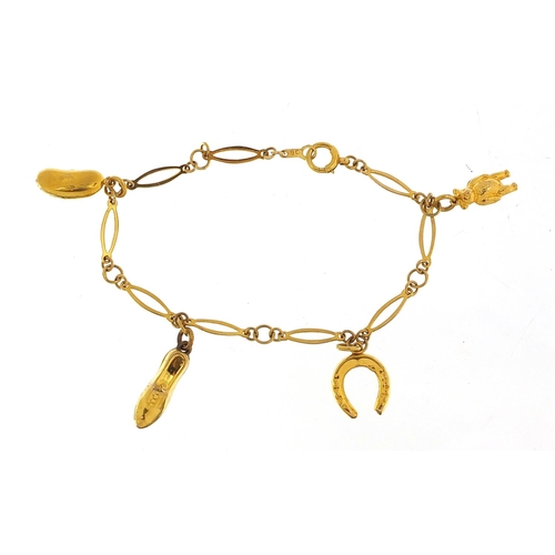 171 - 9ct gold charm bracelet with four 9ct gold charms, 18cm in length, 3.8g