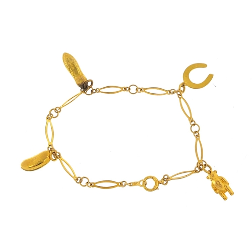 171 - 9ct gold charm bracelet with four 9ct gold charms, 18cm in length, 3.8g