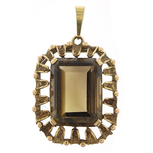 130 - 9ct gold smoky quartz pendant, 4cm high, 9.8g