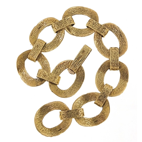 6 - 1970s 9ct gold bark design bracelet with oval links, HB makers mark, 18cm in length, 43.8g
