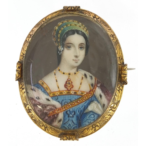 293 - Oval hand painted portrait miniature of a young female housed in a gilt metal brooch mount, 5cm high... 