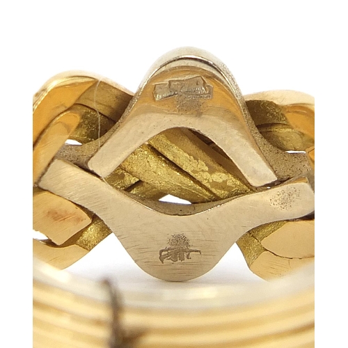 27 - 18ct two tone gold six section puzzle ring, size S, 9.2g