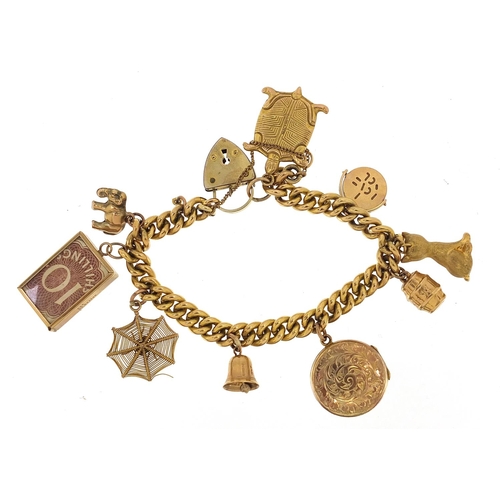 194 - Yellow metal charm bracelet with eight 9ct gold charms and a gilt metal locket, total weight 37.4g