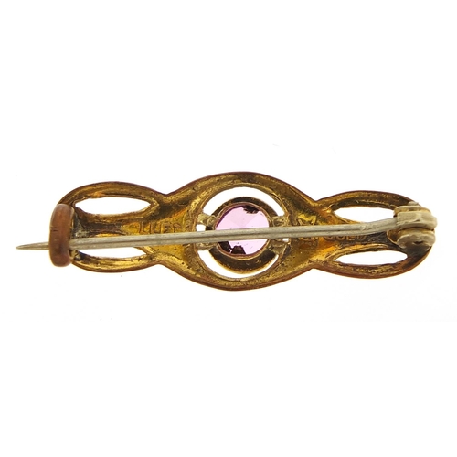 192 - Charles Horner, Art Nouveau rolled gold bar brooch set with a pink stone, 2.7cm wide, 1.5g