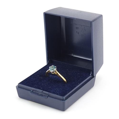 108 - 18ct gold and platinum blue stone solitaire ring, possibly aquamarine, size N, 3.5g