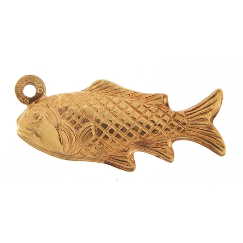 217 - 18ct gold fish charm, 2.2cm in length, 2.0g