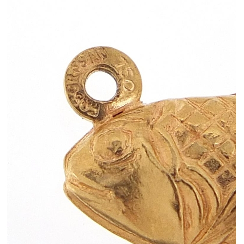 217 - 18ct gold fish charm, 2.2cm in length, 2.0g