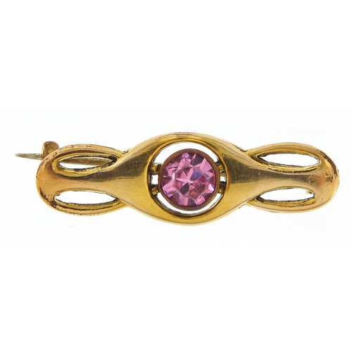 192 - Charles Horner, Art Nouveau rolled gold bar brooch set with a pink stone, 2.7cm wide, 1.5g