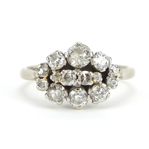 1 - 18ct white gold and platinum diamond cluster ring, the largest diamond approximately 0.34ct, size M,... 