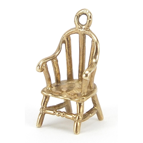 262 - 9ct gold stick back chair charm, 1.6cm high, 1.1g