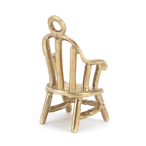 262 - 9ct gold stick back chair charm, 1.6cm high, 1.1g