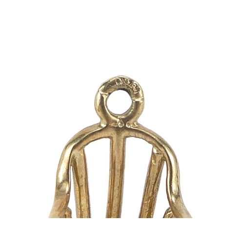 262 - 9ct gold stick back chair charm, 1.6cm high, 1.1g