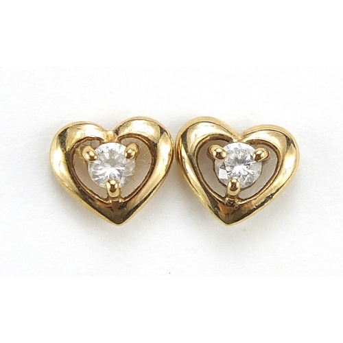 335 - Pair of unmarked gold love heart clear stone stud earrings, 6mm high, 0.7g