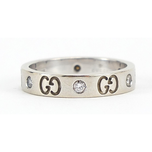 39 - Gucci, 18ct gold diamond eternity ring, size M, 4.3g