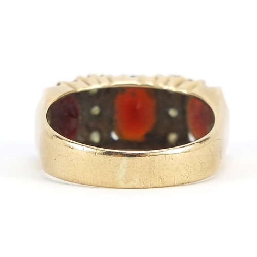 266 - 9ct gold garnet and clear stone ring, size O, 4.3g