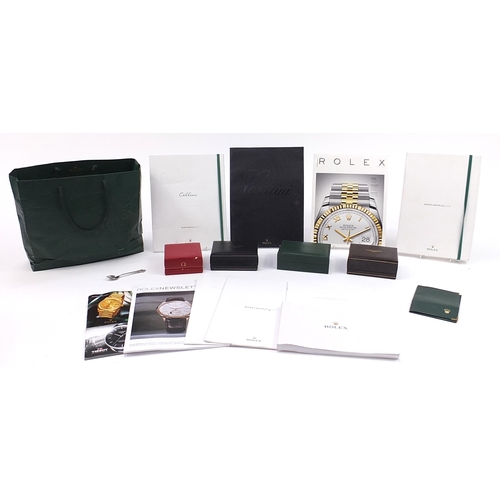 2153 - Four vintage and later watch boxes and a selection of Rolex brochures to include Omega and Longines,... 