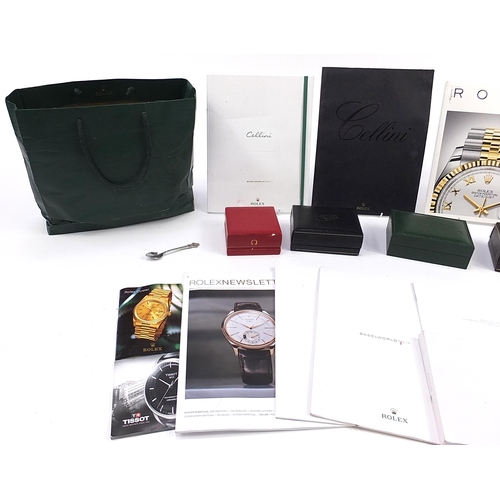 2153 - Four vintage and later watch boxes and a selection of Rolex brochures to include Omega and Longines,... 