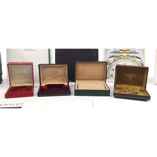 2153 - Four vintage and later watch boxes and a selection of Rolex brochures to include Omega and Longines,... 