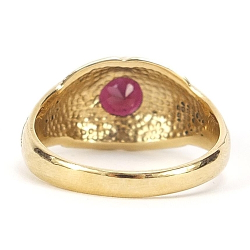 243 - 9ct gold garnet solitaire ring with engraved shoulders, size T, 6.8g