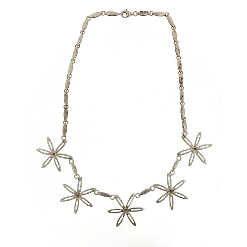 253 - Modernist silver flower head necklace set with blue stones, 40cm in length, 26.2g