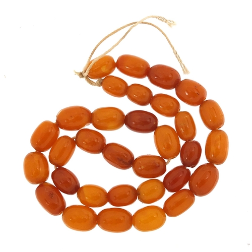 128 - Butterscotch amber coloured bead necklace, 9mm wide, 30cm in length, 8.5g