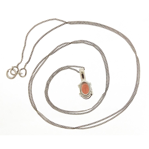 242 - Unmarked white metal red stone pendant on a 9ct white gold necklace, 1.3cm high and 48cm in length, ... 