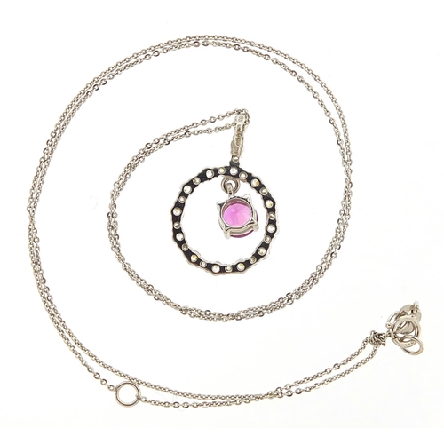 111 - 9ct white gold pink sapphire and clear stone drop pendant on a 9ct white gold necklace, 2.2cm high a... 