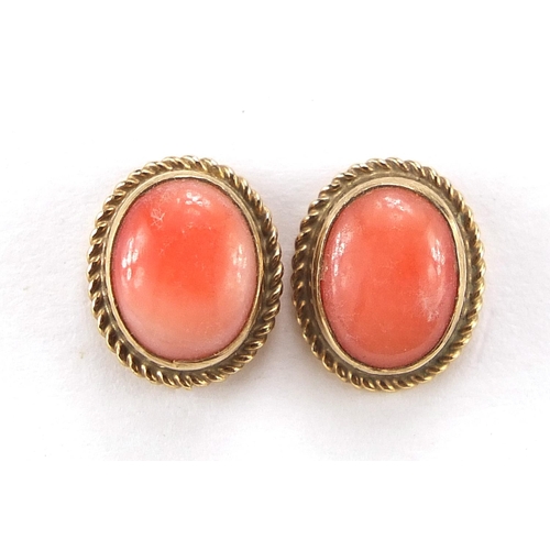 273 - Pair of 9ct gold cabochon coral stud earrings, 1.1cm high, 2.0g