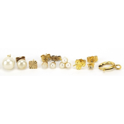 191 - Group of 9ct gold and yellow metal earrings and a clasp, the largest 2.2cm high, total weight 6.4g