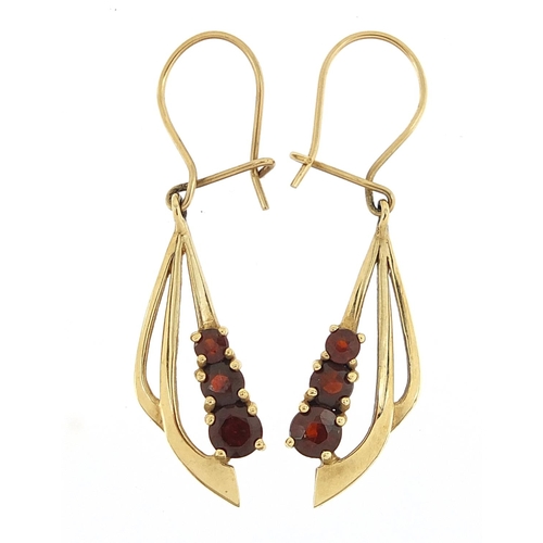 348 - Pair of unmarked gold garnet drop earrings, 3.5cm high, 1.9g