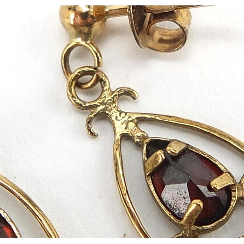 263 - Pair of 9ct gold garnet tear drop earrings, 2.1cm high, 1.1g