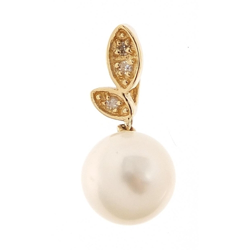 296 - 9ct gold pearl and diamond pendant, 1.6cm high, 0.9g