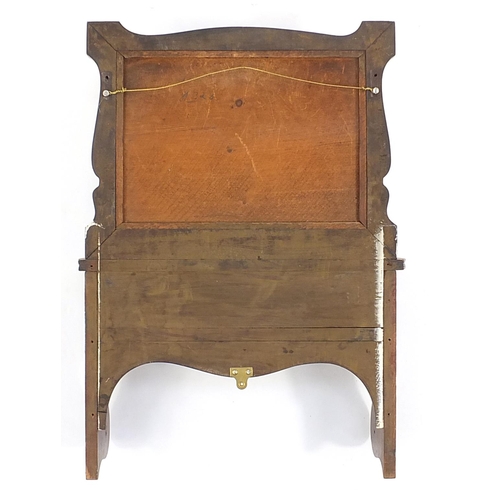 1494 - Edwardian mahogany wall mirror with bevelled glass above compartment, 66cm high x 44.5cm wide