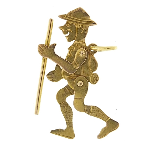 244 - 9ct gold scout charm with articulated limbs, 2.6cm high, 1.2g