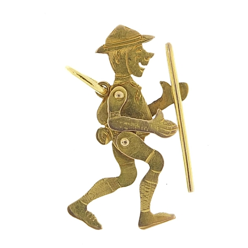 244 - 9ct gold scout charm with articulated limbs, 2.6cm high, 1.2g