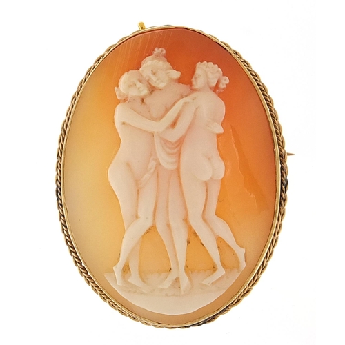 250 - 9ct gold mounted cameo brooch carved with three nude maidens, 4.1cm high, 11.8g