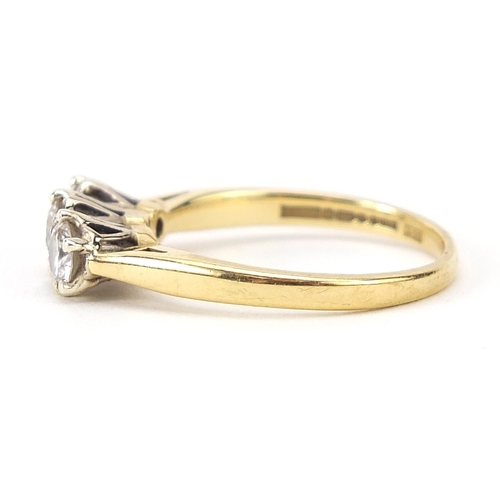 292 - 18ct gold diamond three stone ring, total diamond weight approximately 0.51ct, size J, 2.6g