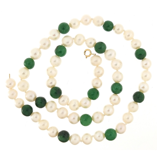 321 - Freshwater pearl and green jade bead necklace with 18ct gold clasp, 44cm in length, 29.5g