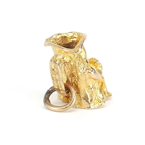 339 - 9ct gold Toby jug charm, 1.1cm high, 2.1g