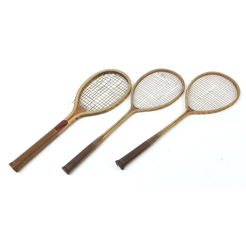 1996 - Three early 20th century lawn tennis racquets including Arrow, the largest 66cm in length