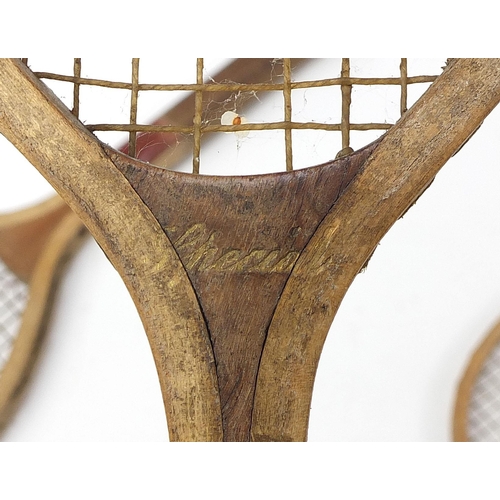 1996 - Three early 20th century lawn tennis racquets including Arrow, the largest 66cm in length