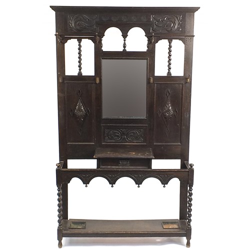 1493 - Antique carved oak hall stand with mirrored back and glove box, 215cm H x 122cm W x 31cm D