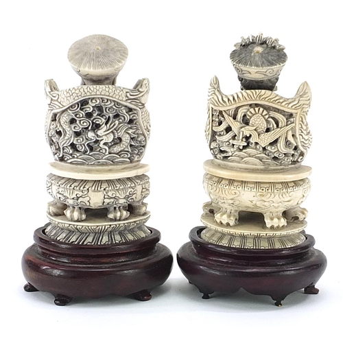 2 - Pair of Chinese Canton ivory carvings of an emperor and empress seated on thrones, each raised on ca... 